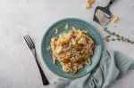 Plato de fettuccini con salsa boscaiola