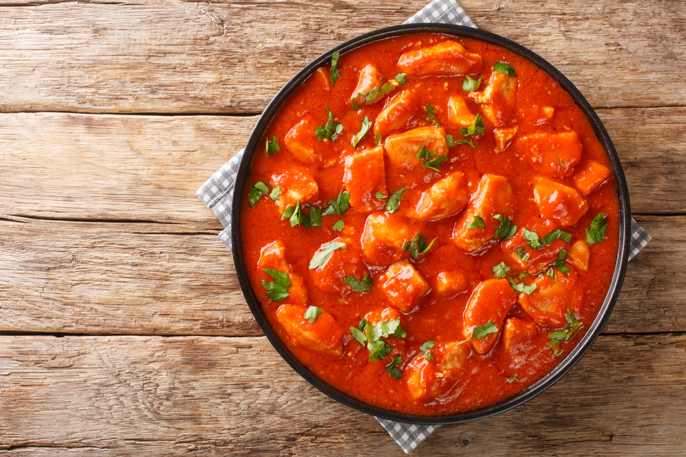 Romanian,Ostropel,Chicken,With,Garlicky,Tomato,Gravy,Closeup,In,The