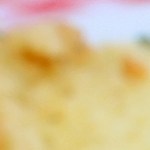 Milanesa de pollo empanizada con queso parmesano fundido