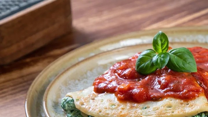 Crepes salados rellenos de espinaca y ricotta