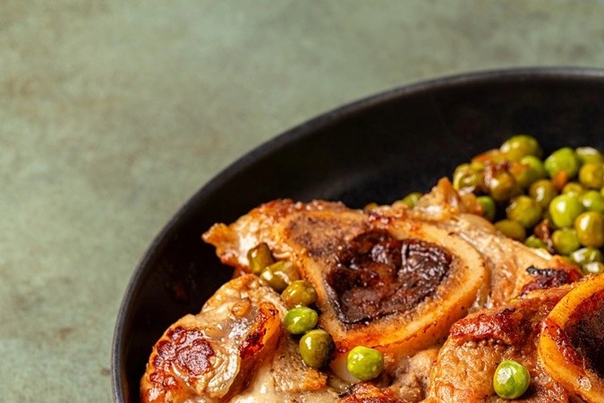 Osobuco con guisantes
