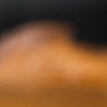 Una cucharada de dulce de leche vertido sobre unas crepas