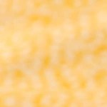 Una copa con dos bolas de sorbete de pera decorado con menta