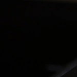 Dos arepa frita en un sartén con aceite