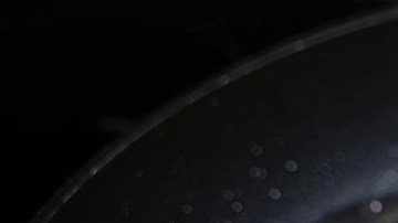 Dos arepa frita en un sartén con aceite